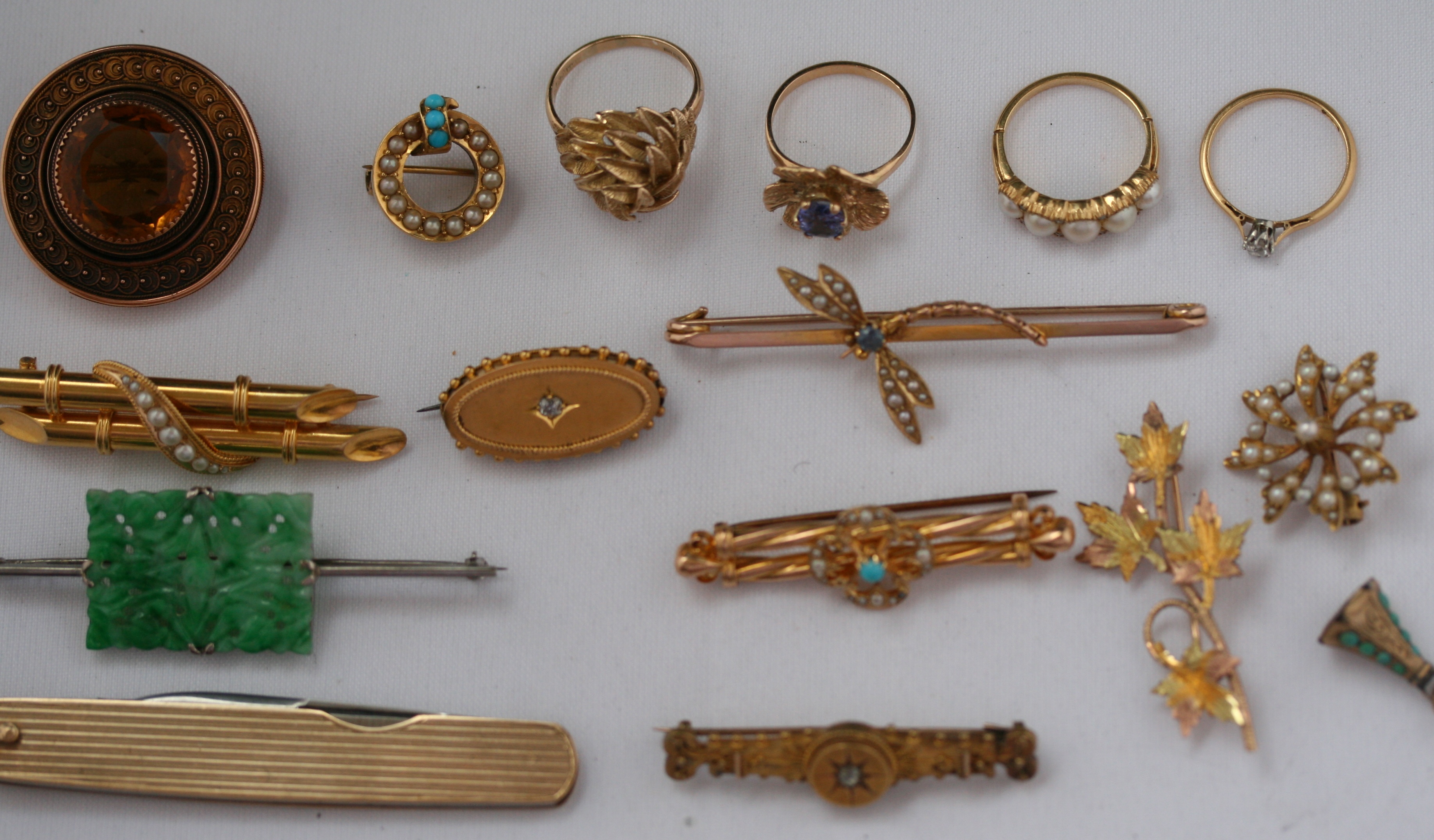 A collection of gold and gem set jewellery to include;