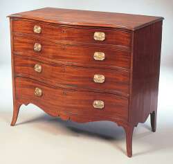 A George III mahogany serpentine chest of drawers