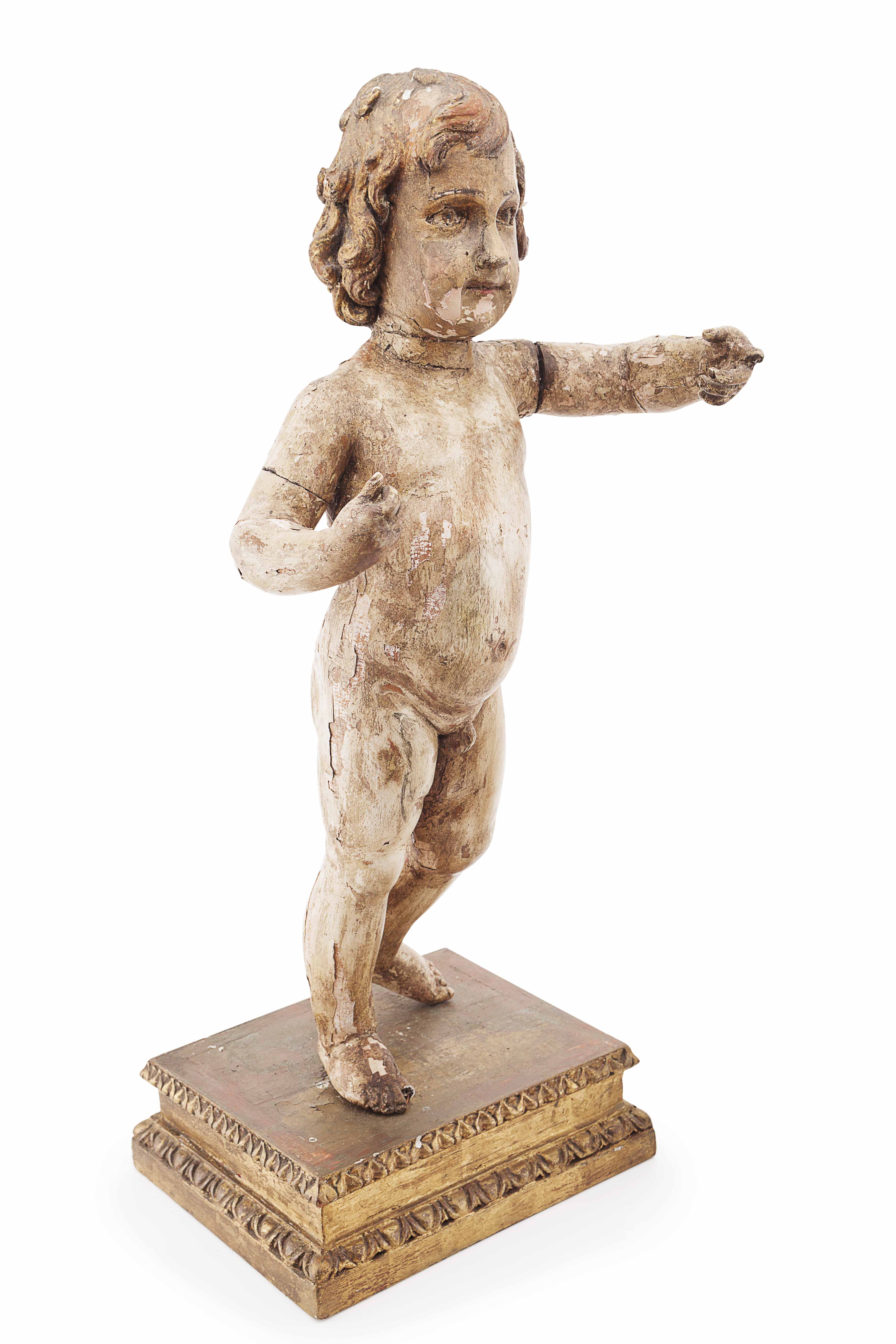 CONTINENTAL CARVED WOOD, GESSO AND POLYCHROME FIGURE OF A BOY