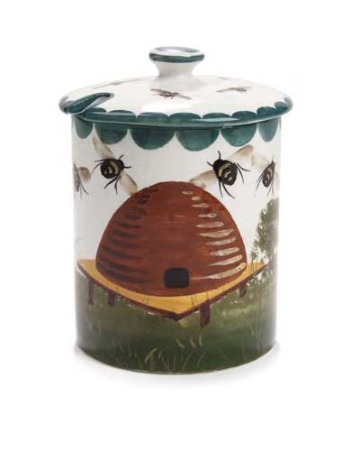 A Wemyss honey pot and cover,