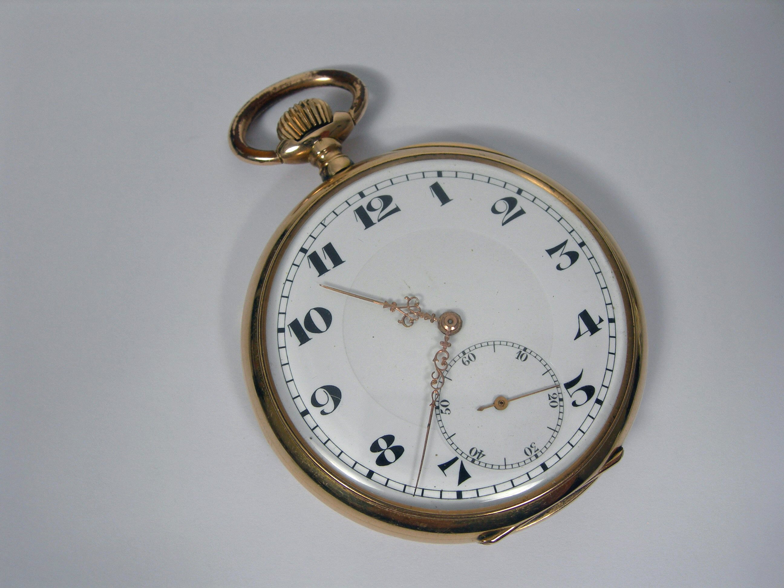 An open faced pocket watch,
