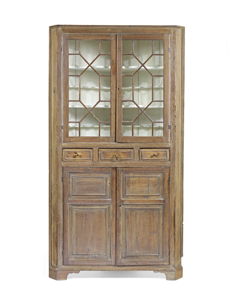 A George III pine corner cupboard