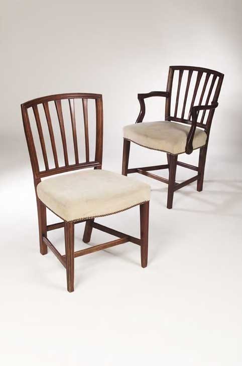 A set of ten George III mahogany dining chairs,