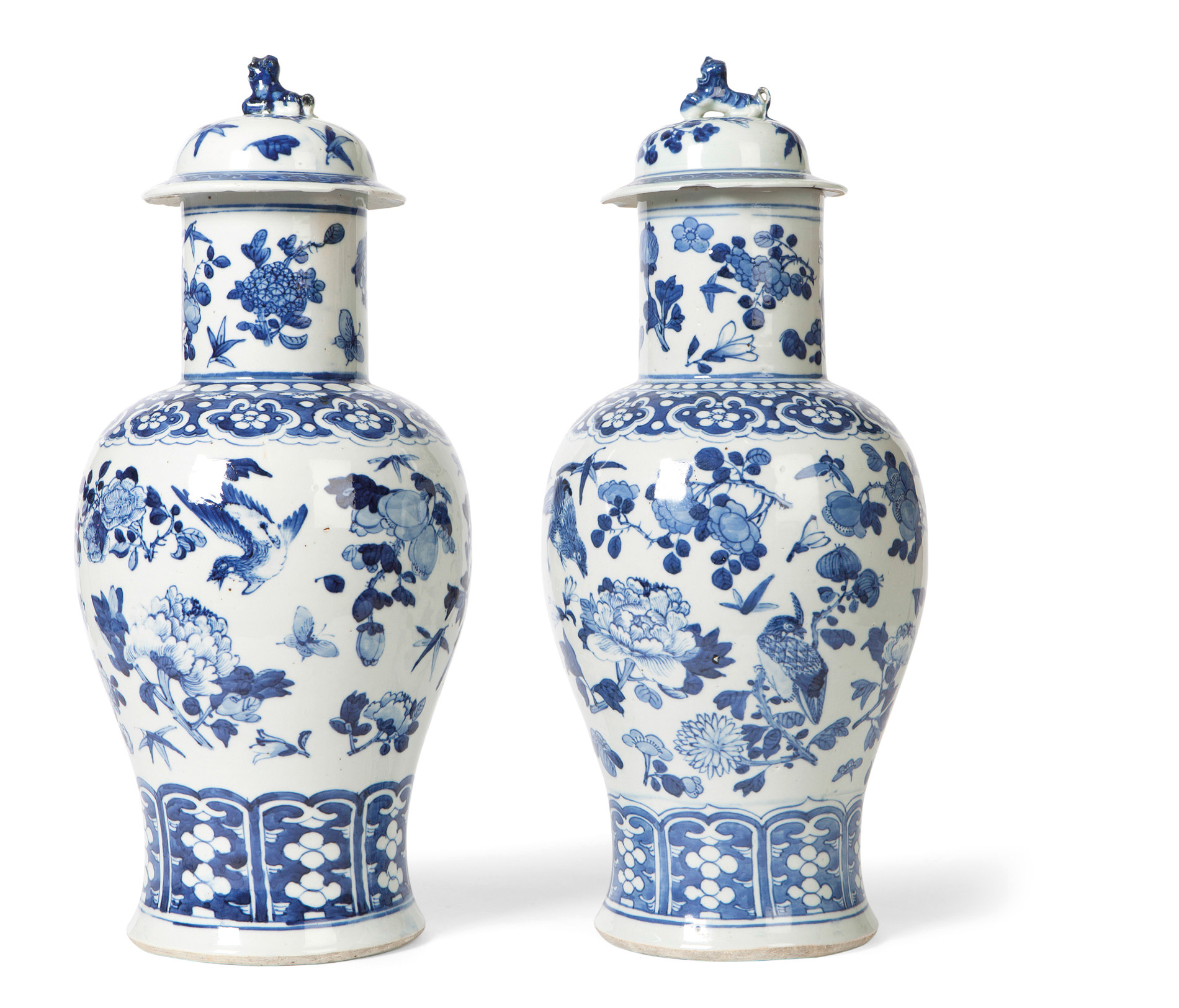PAIR OF BLUE AND WHITE COVERED VASES