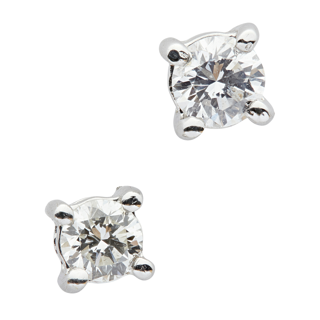 A pair of diamond set stud earrings