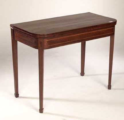 A George III mahogany foldover tea table,