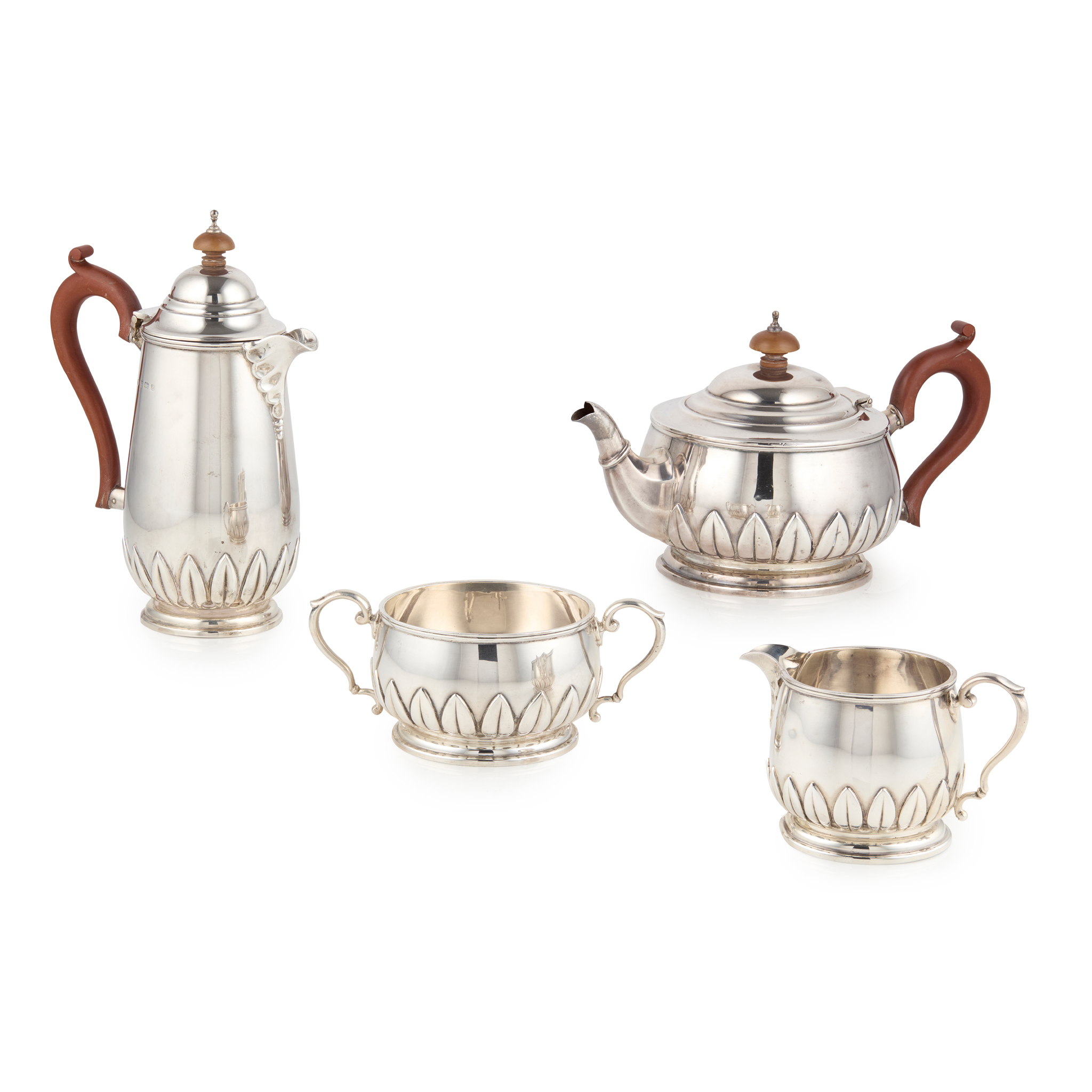 A MATCHED 1920s FOUR PIECE TEA SERVICE