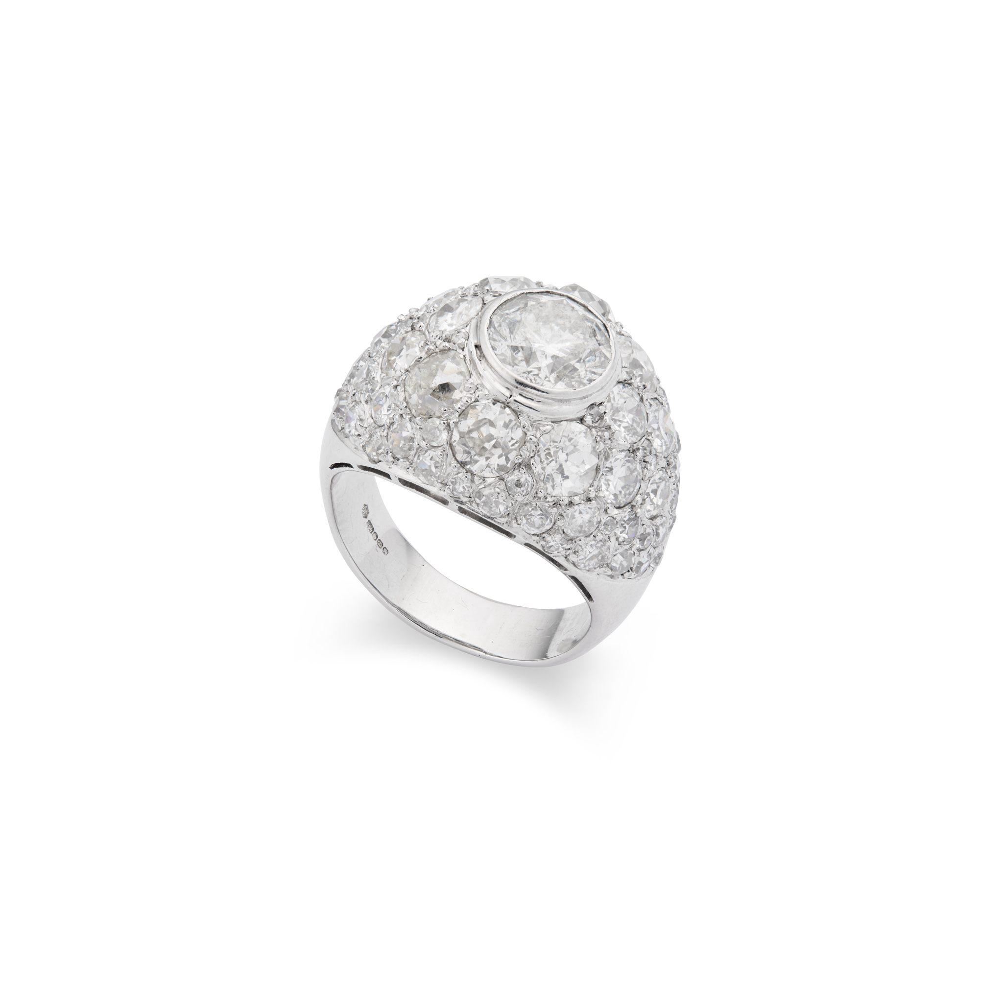 A white gold bombé diamond ring