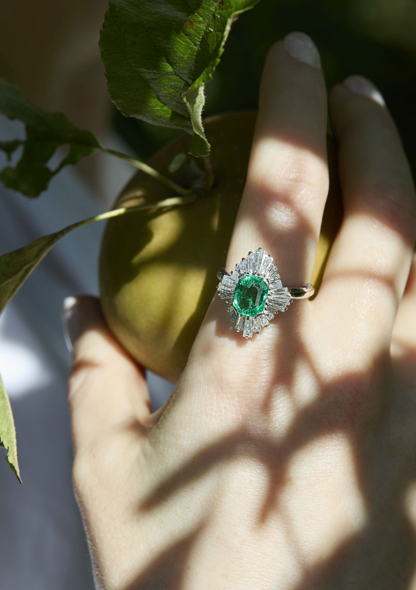 A 1.97 carat emerald and diamond ballerina ring