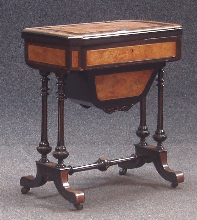 A Victorian burr walnut and ebonised fold-over games table,