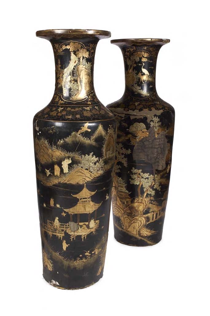 An unusually large pair of early 19th century papier mache and japanned vases,