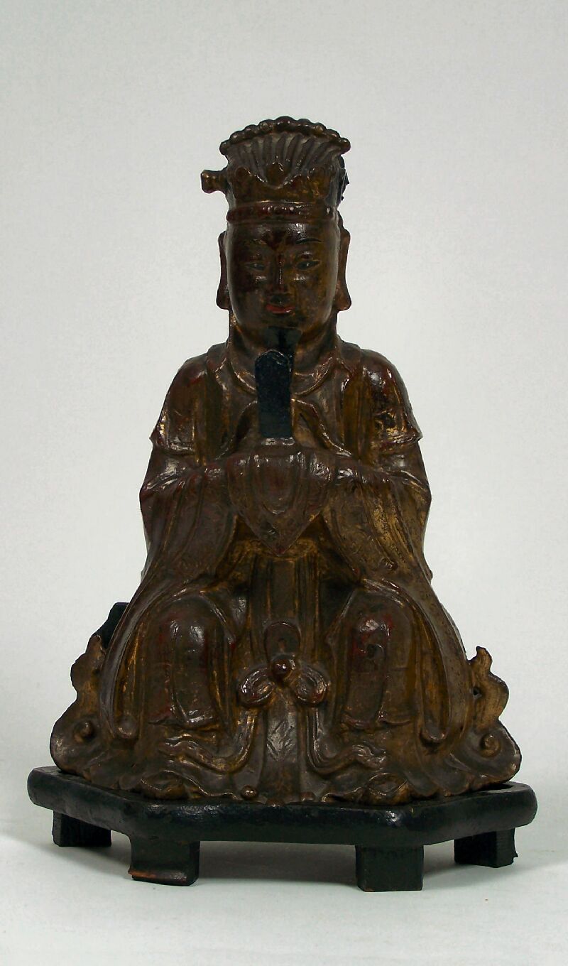 A Chinese gilt bronze figure of an official