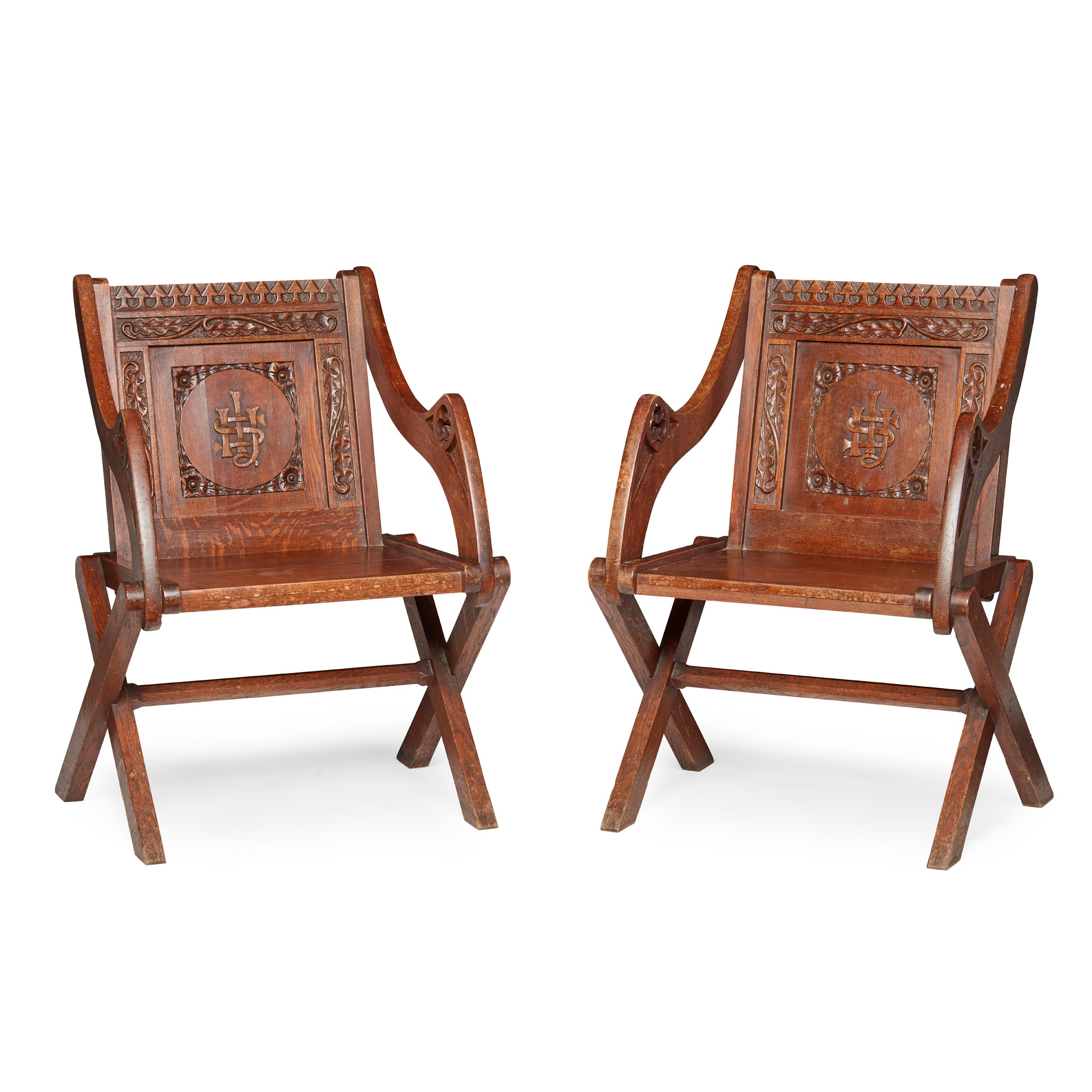 PAIR OF CARVED OAK GLASTONBURY CHAIRS