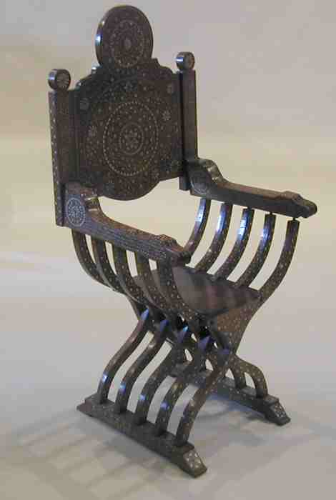 A 19th century Syrian inlaid hardwood armchair,