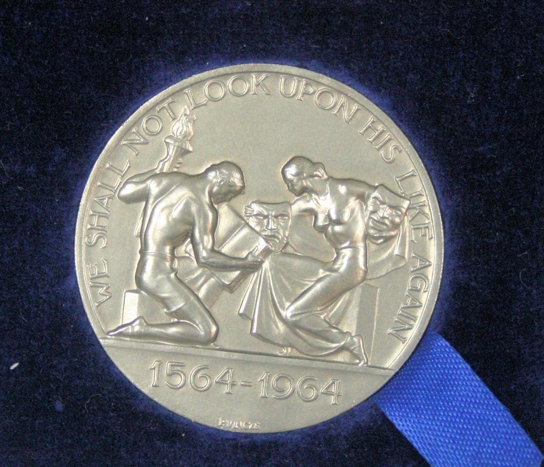 A platinum William Shakespeare medallion