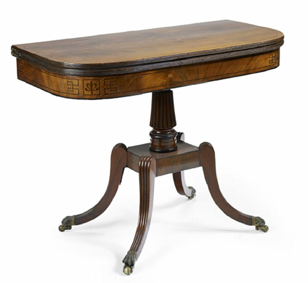A Regency mahogany and ebony strung fold over table