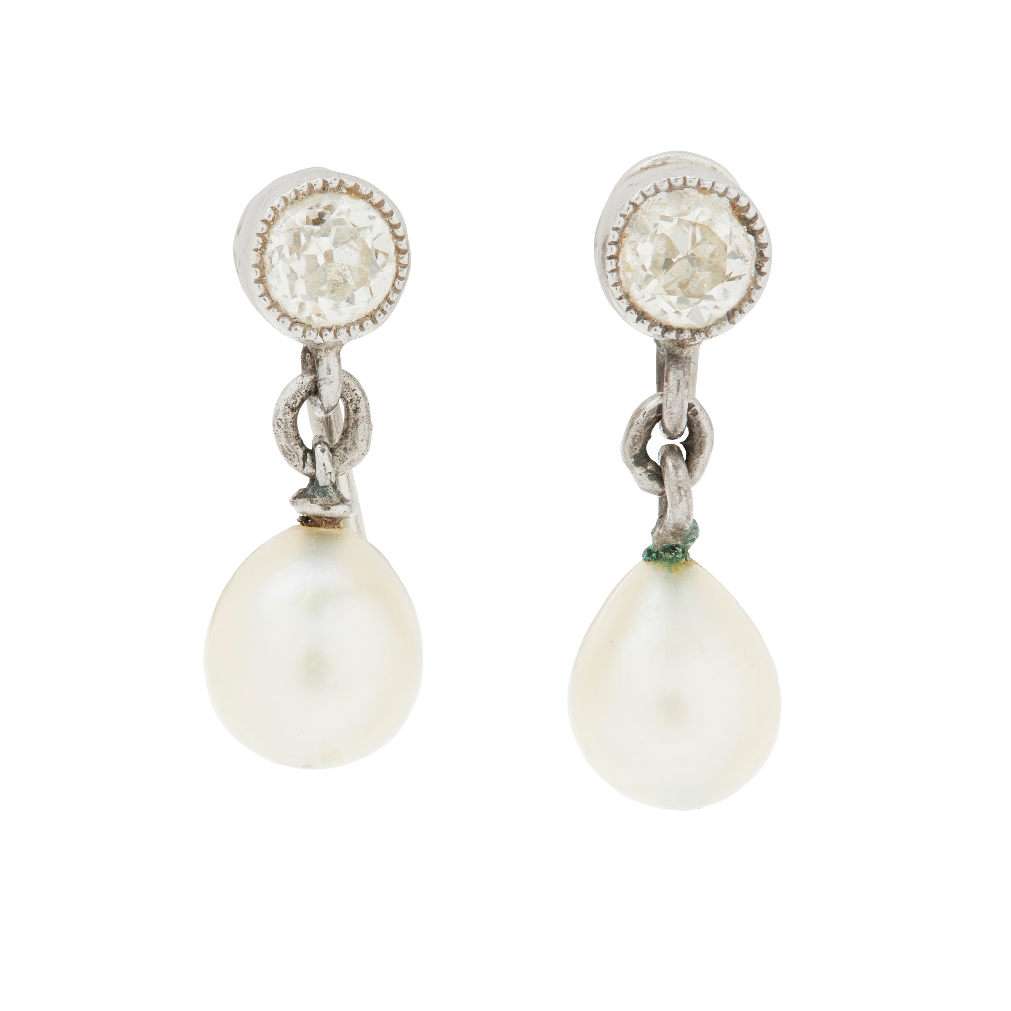 A pair of pearl and diamond earrings