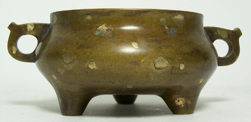 A Chinese bronze censer In the Archaic style