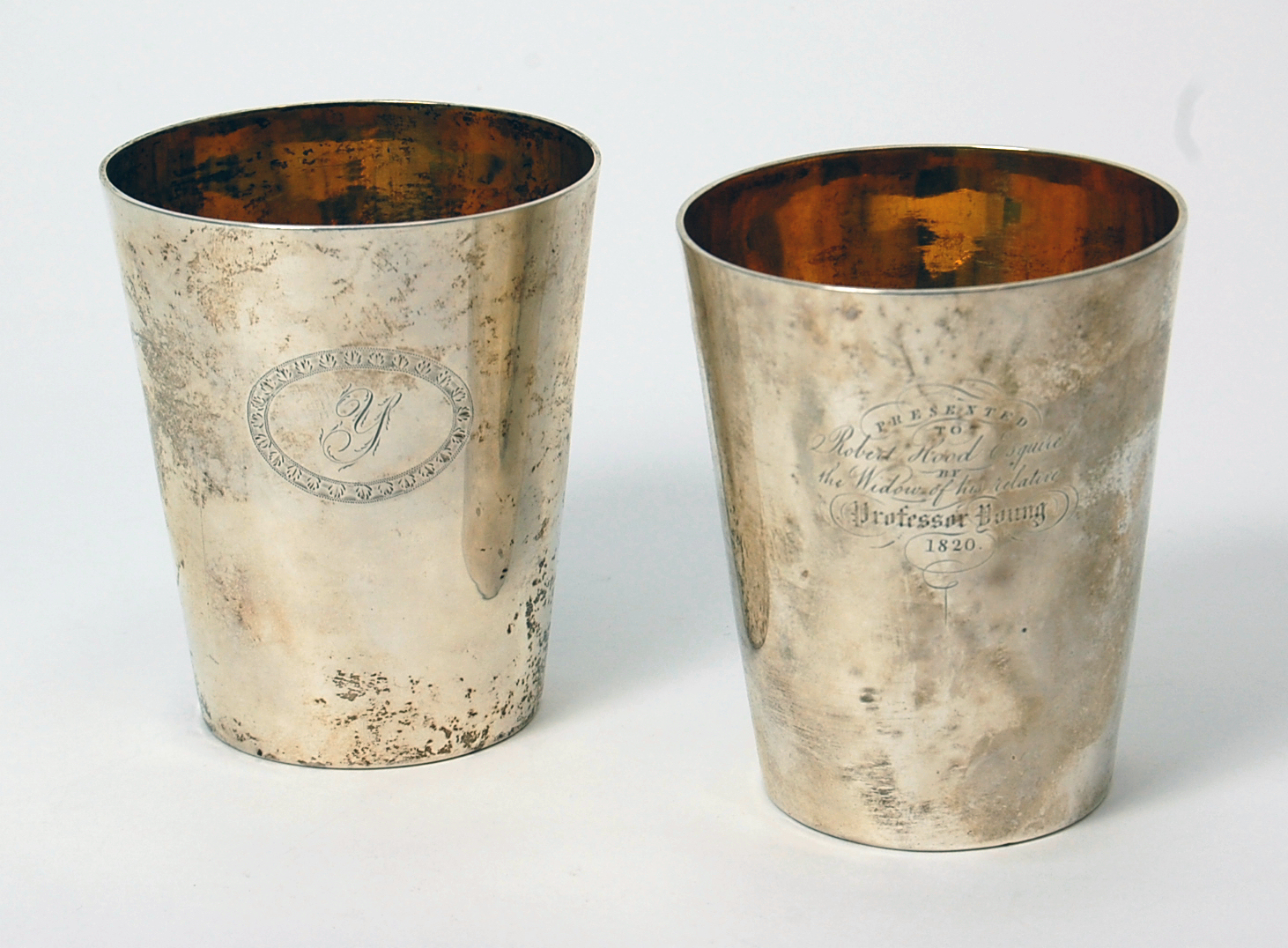 A pair of George III Scottish silver beakers