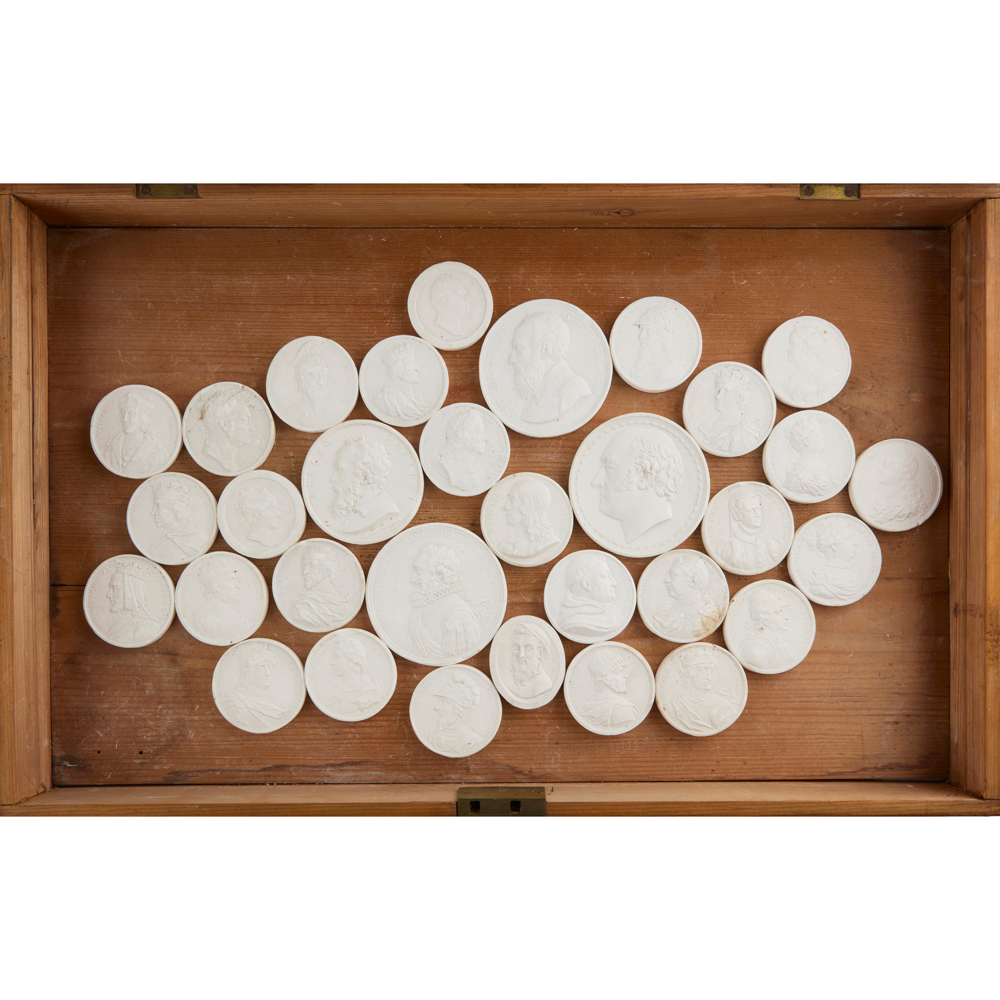 COLLECTION OF PLASTER COINS AND MEDALLIONS