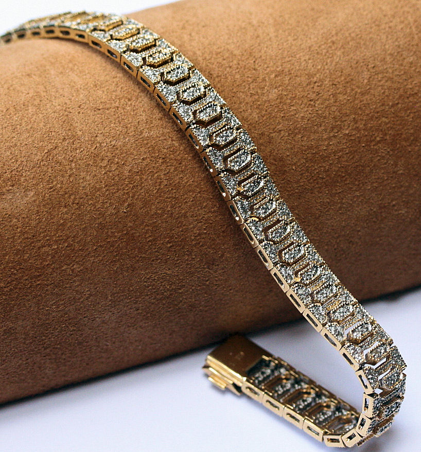 An 18ct gold mounted diamond set bracelet