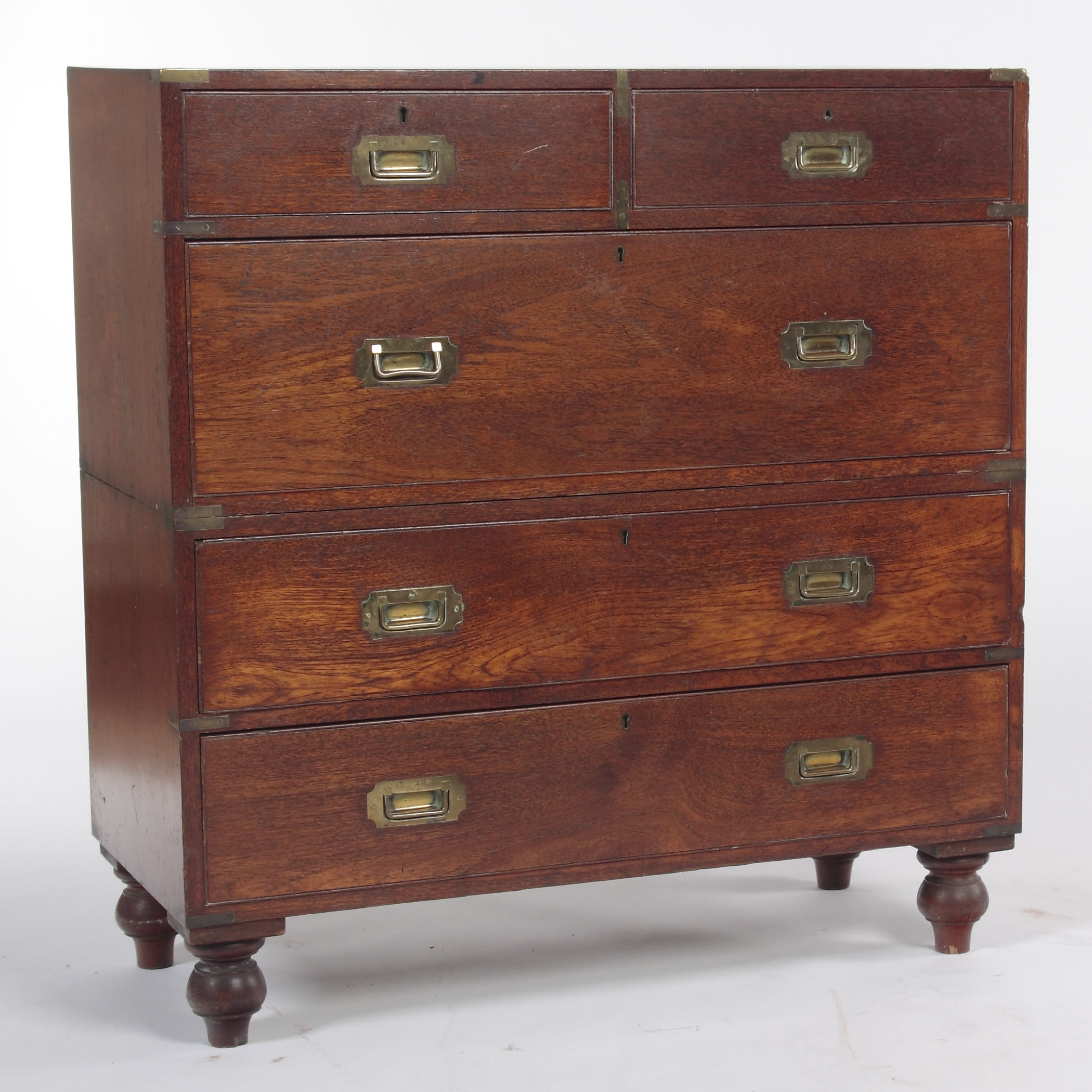 A 19th century mahogany brass bound campaign chest Stamped 'Army & Navy C.S.L. Makers'