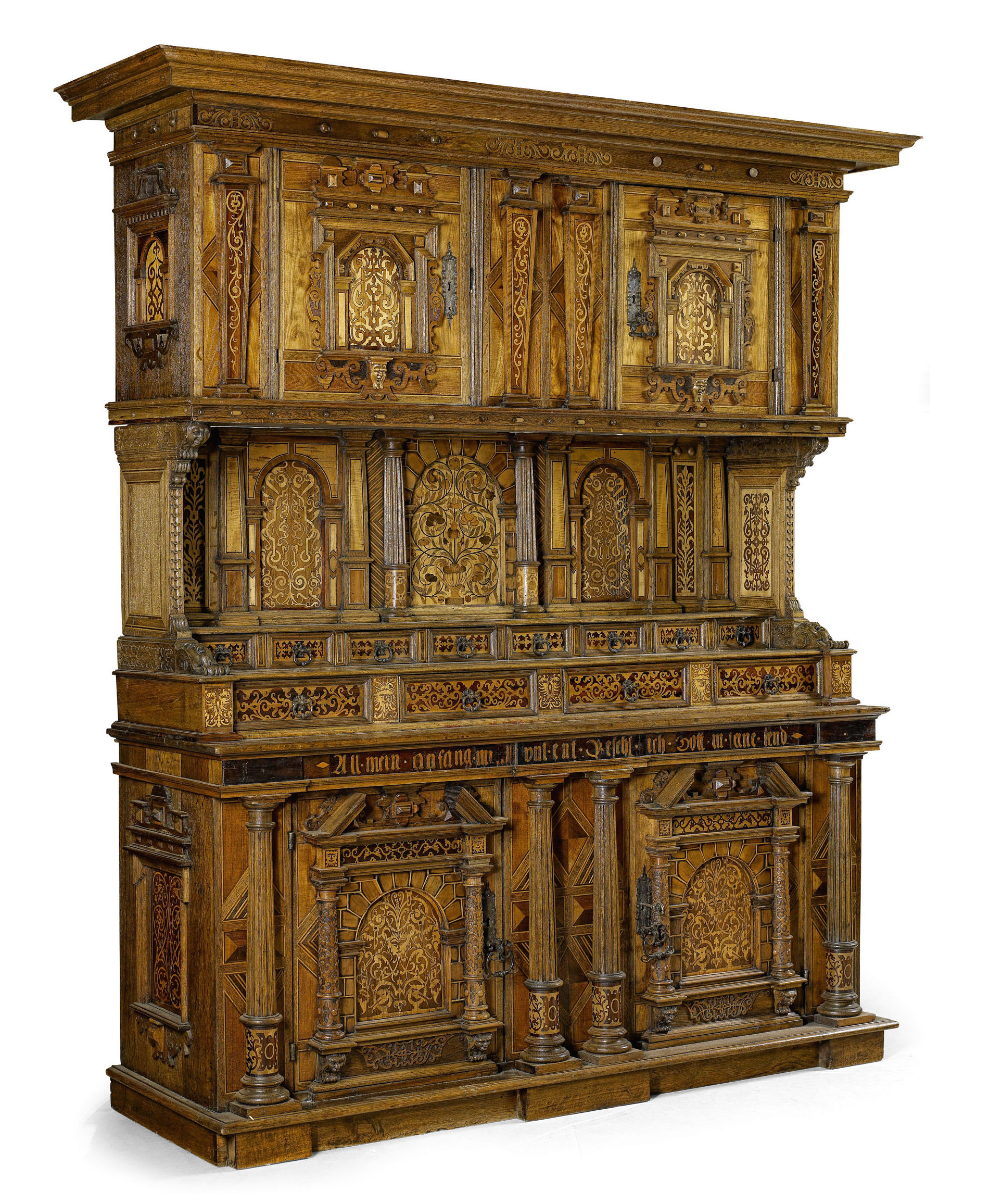 A 17th century and later German oak and strapwork inlaid side cabinet