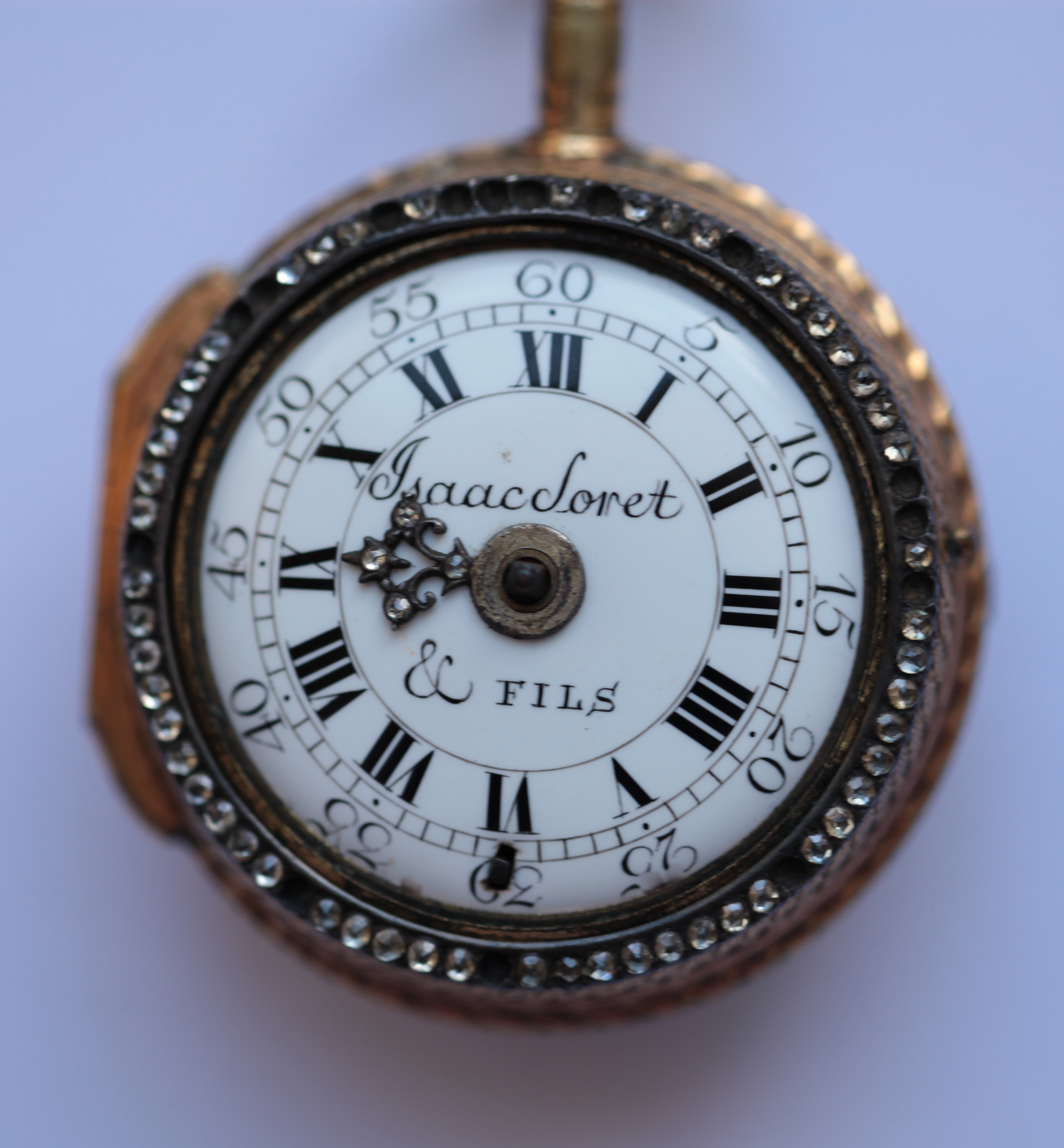 ISAAC SORET - A gilt metal, paste set, pair cased verge pocket watch
