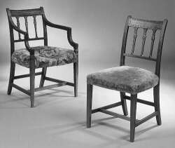 A set of eight George III mahogany dining chairs