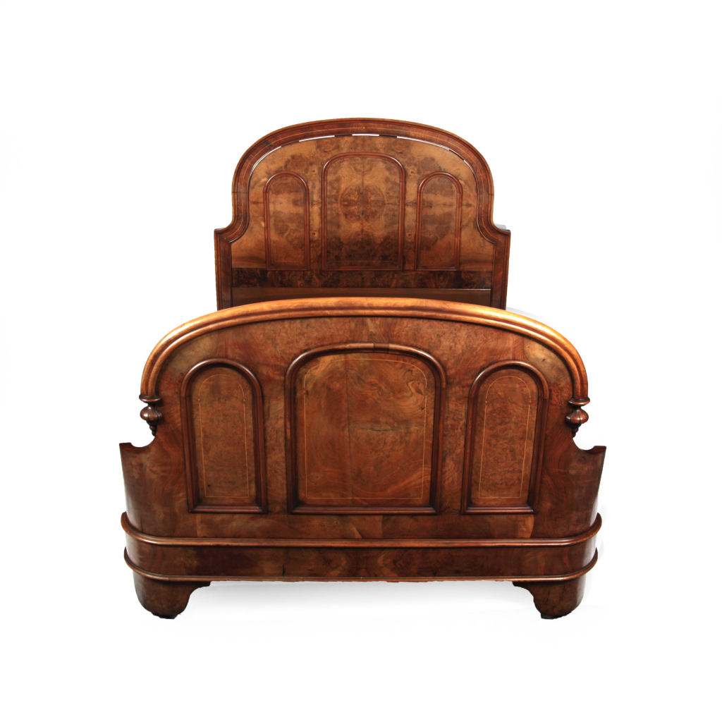 A Victorian walnut double bed