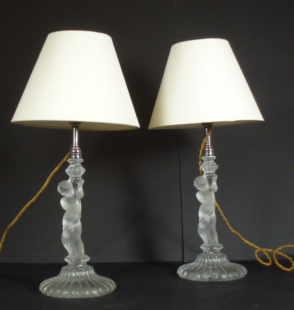 A pair of Baccarat figural glass lamps