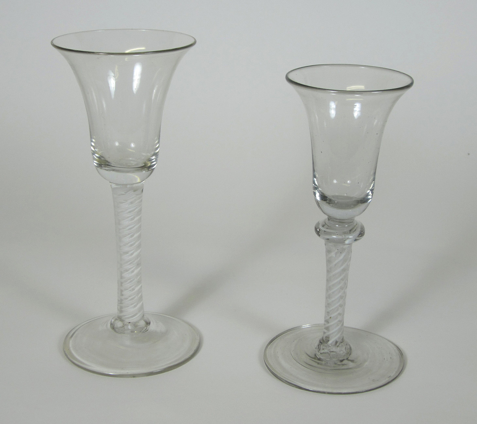 TWO DOUBLE OPAQUE TWIST STEM DRINKING GLASSES