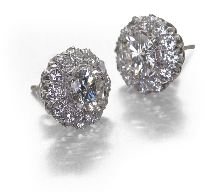 A pair of diamond floral cluster earrings,