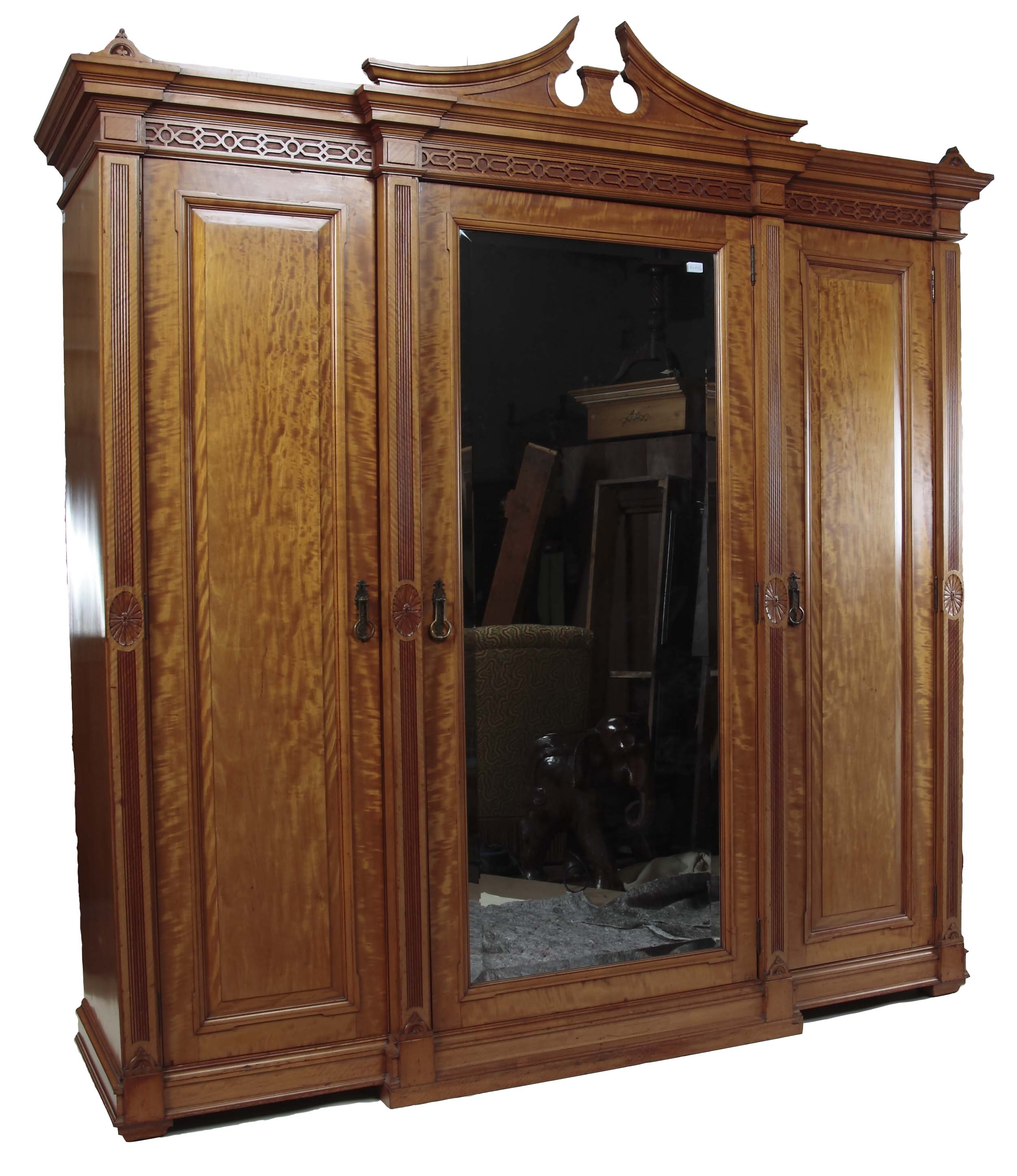 A neo-classical satinwood wardrobe