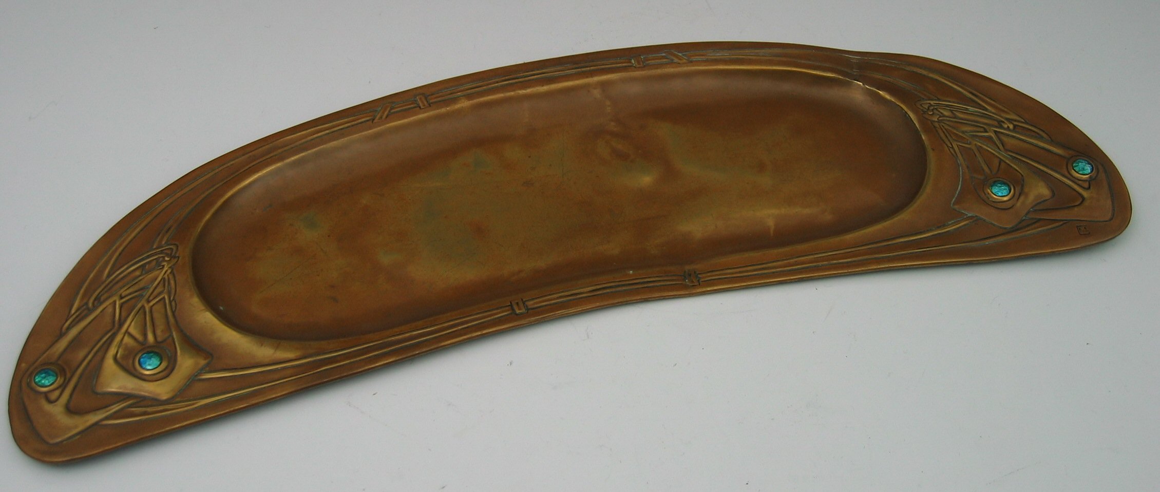 A Margaret Gilmour brass tray,