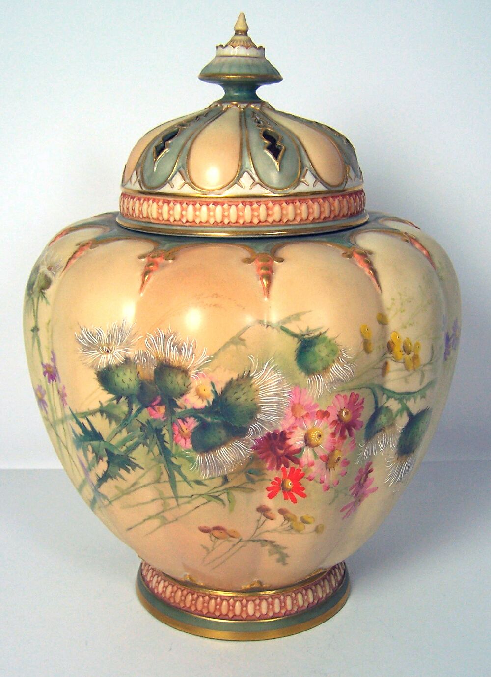 A late 19th century Royal Worcester blush ivory vase and cover