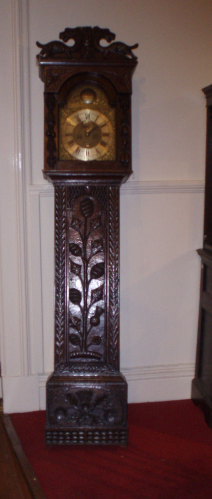 A 19th century elaborate carved oak longcase clock John Davie, Lithgon