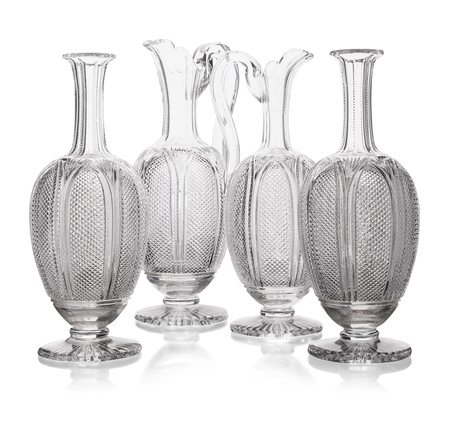 SUITE OF ENGLISH CUT GLASS WINE DECANTERS AND EWERS