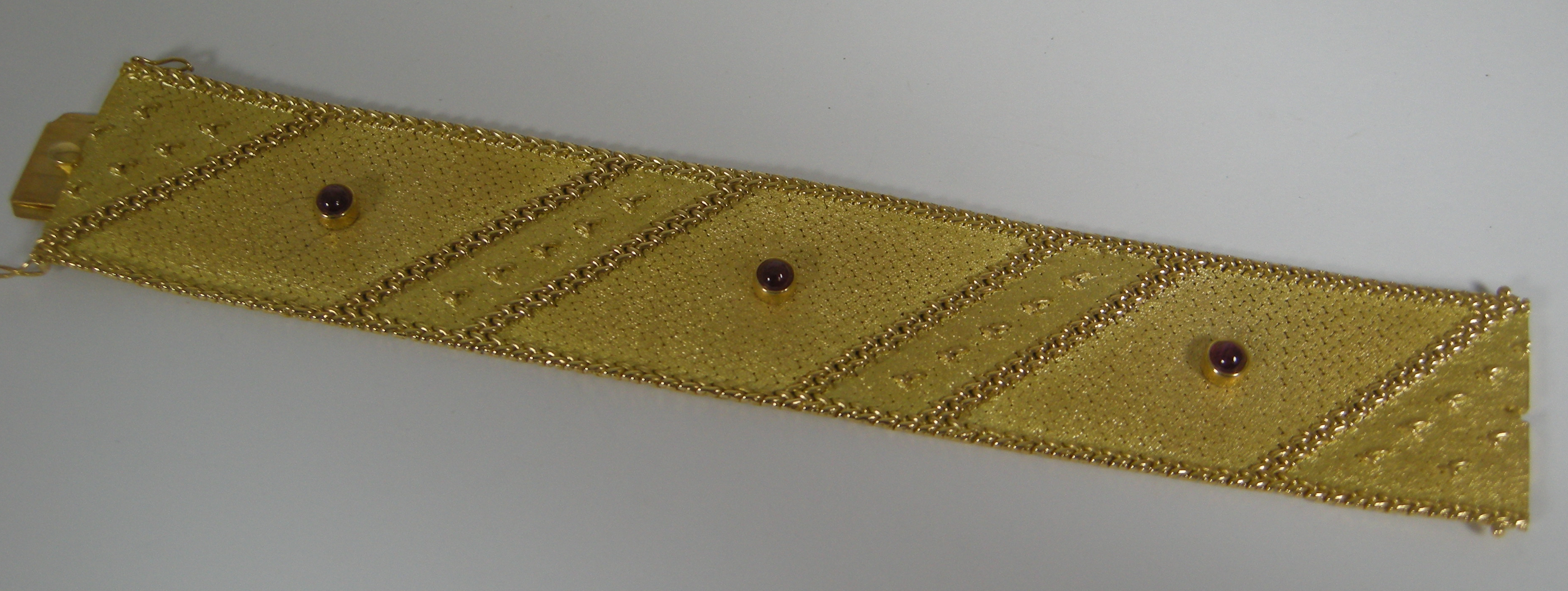 An 18ct gold and ruby set bracelet