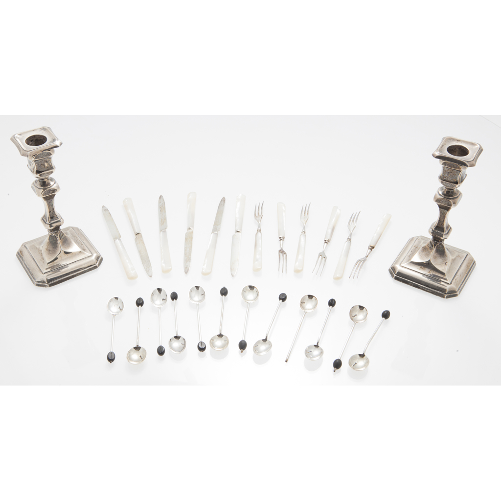 A pair of George II style candlesticks