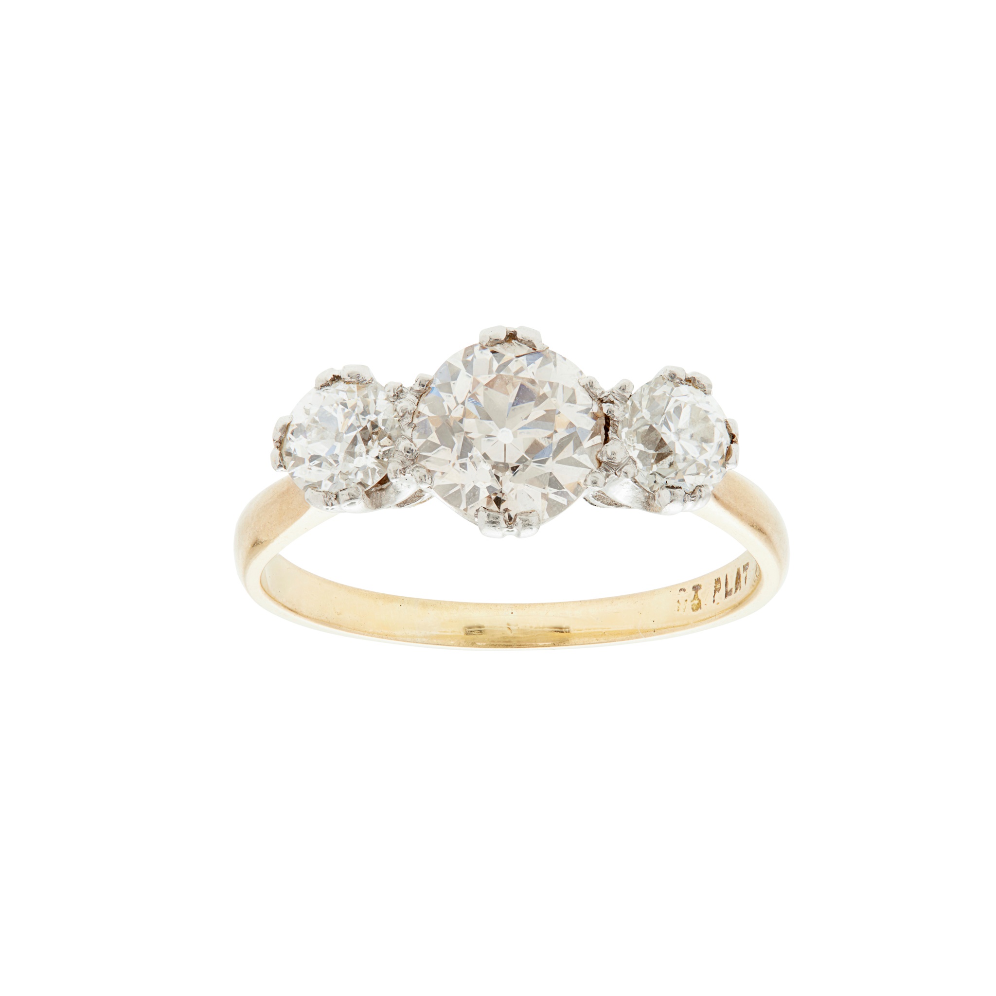 A three stone yellow gold diamond ring