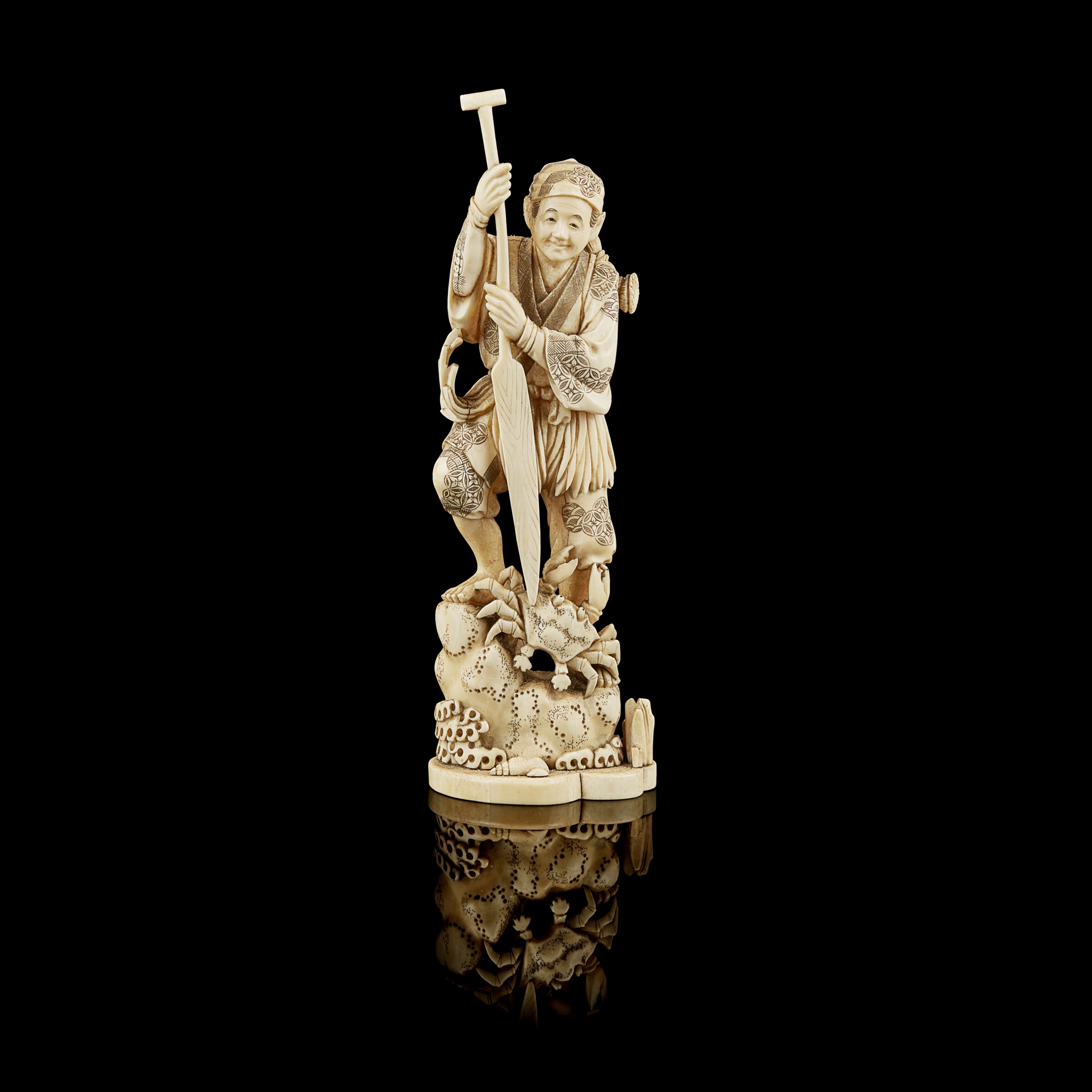 IVORY OKIMONO OF A FISHERMAN