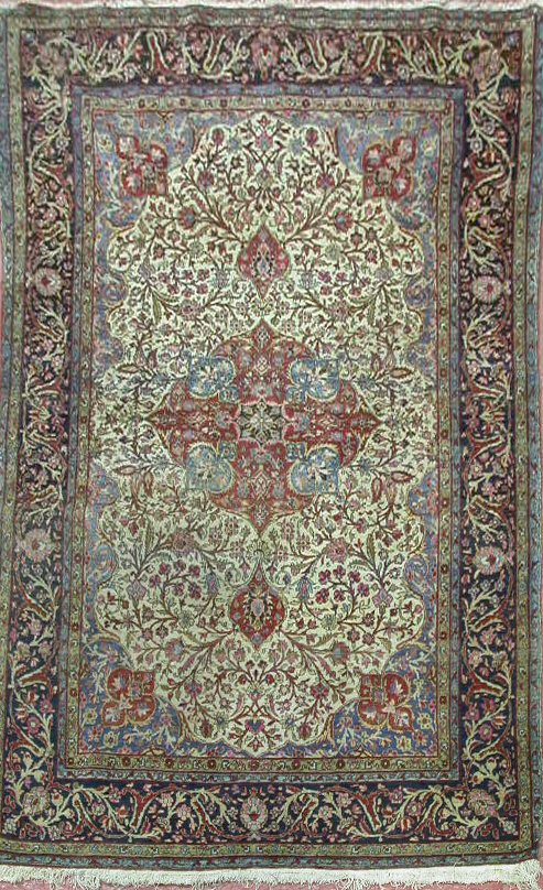 A Kashan rug,