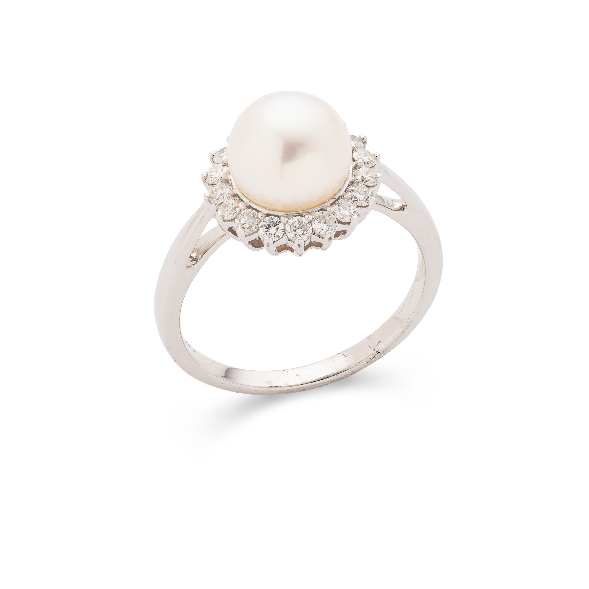 A cultured pearl and diamond ring