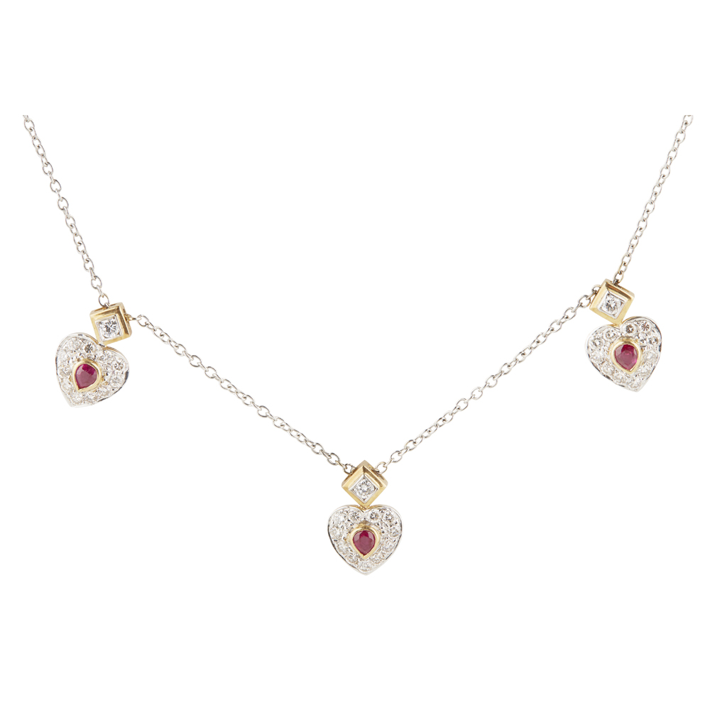 A ruby and diamond set cluster pendant