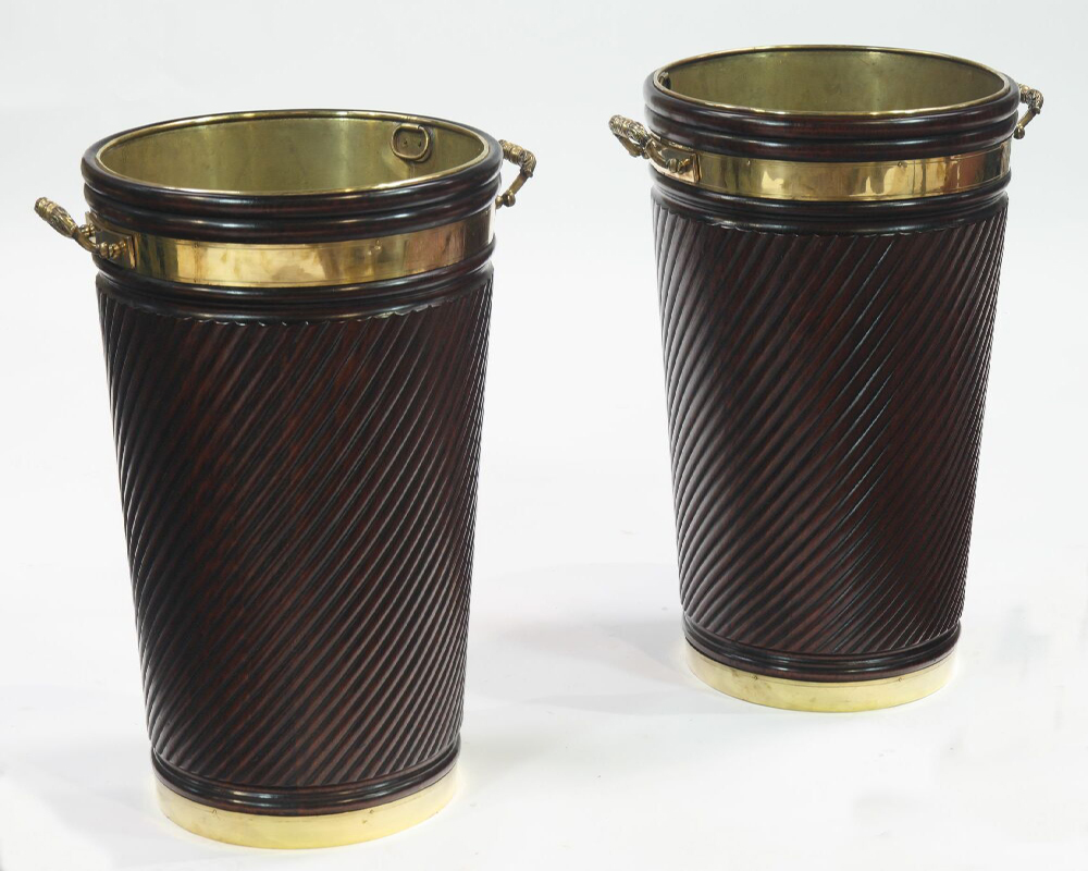 A large pair of Georgian style mahogany and brass bound peat buckets