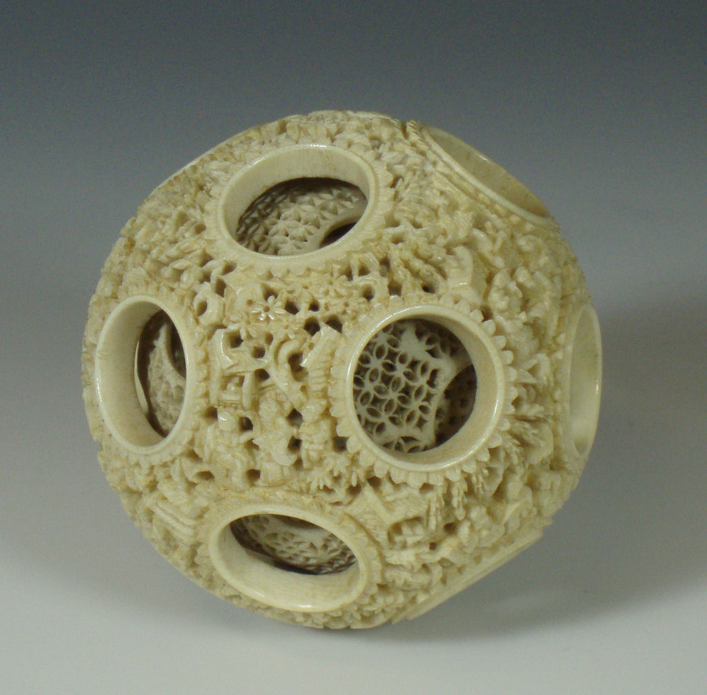 A large early 20th century Chinese ivory puzzle ball