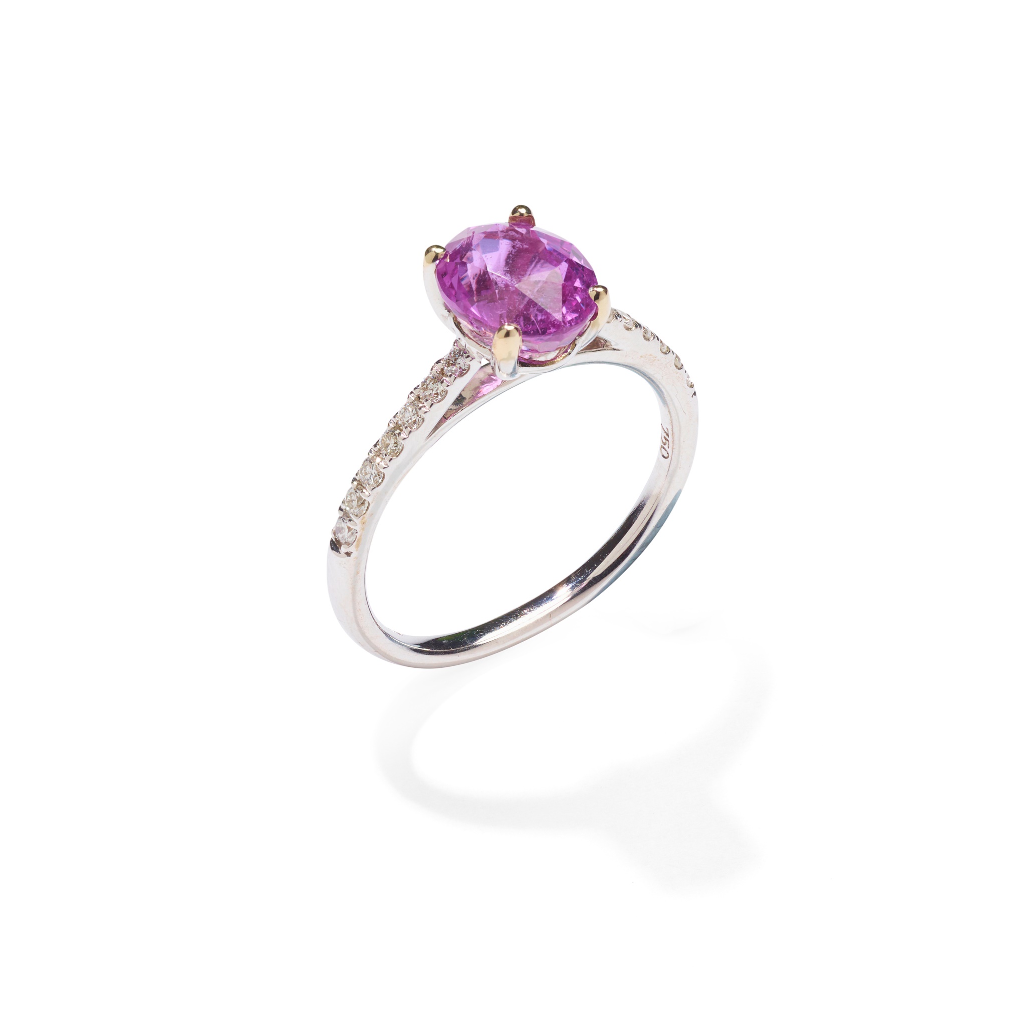 A pink sapphire and diamond ring