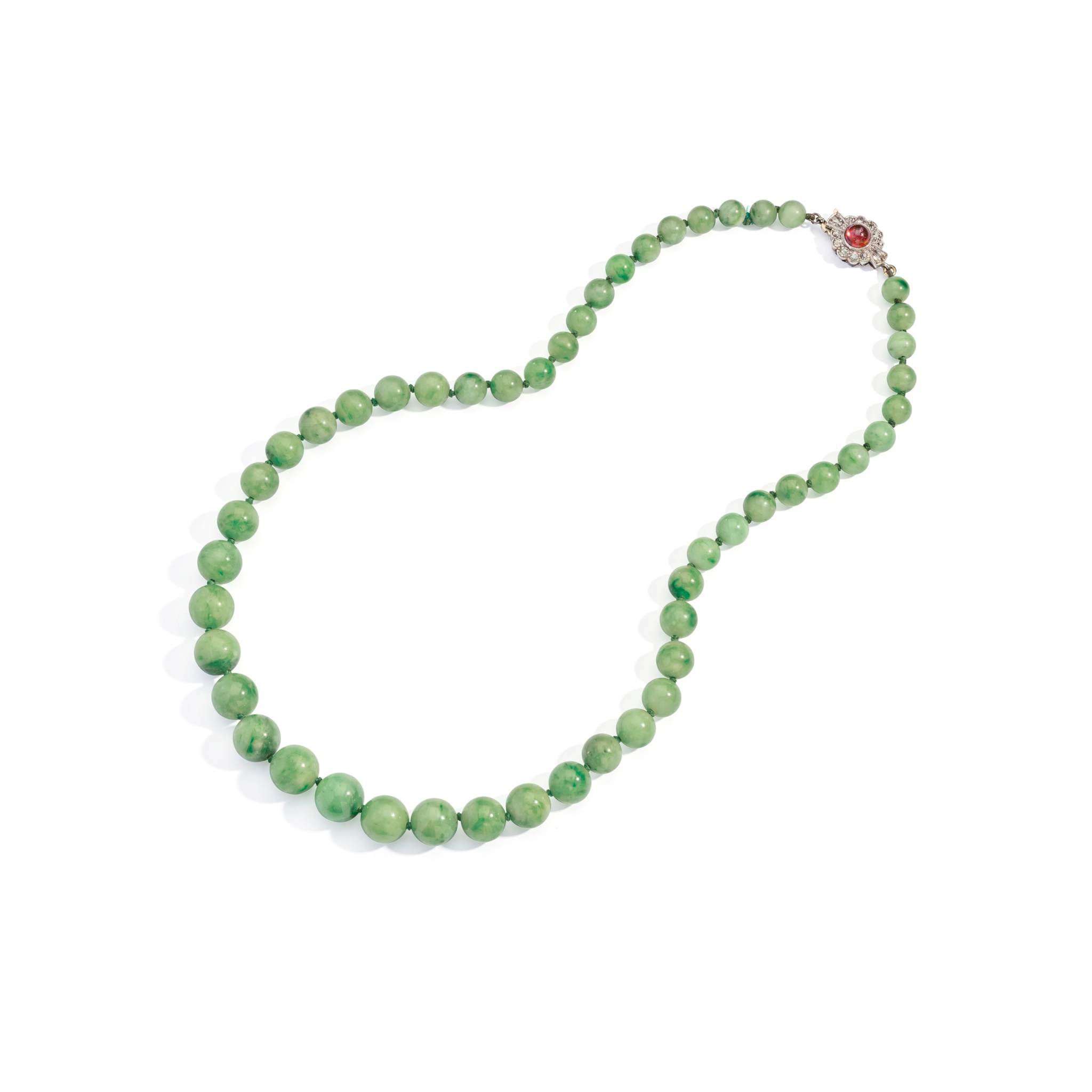 An early 20th century jadeite jade, ruby and diamond necklace, circa 1930