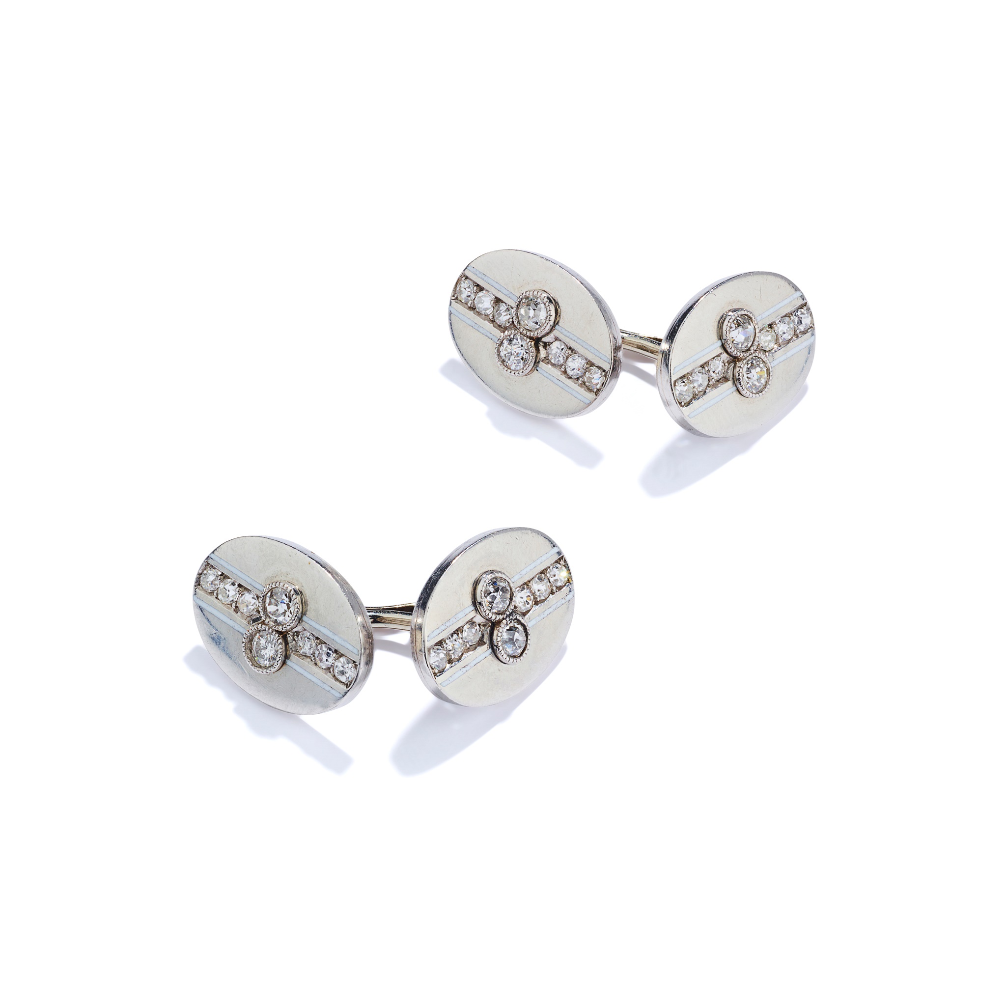 A pair of early 20th century diamond and white enamel cufflinks, circa 1920